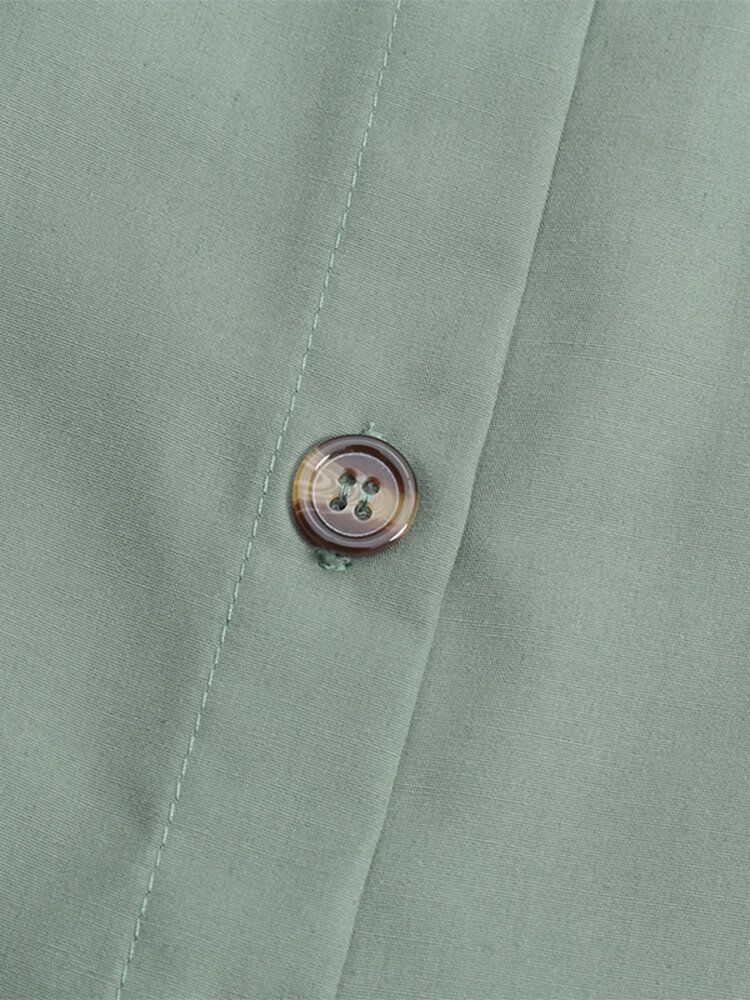 Kvinnor Enfärgad Knapp Främre Stativ Krage Elastisk Manschett Casual Longline Blus
